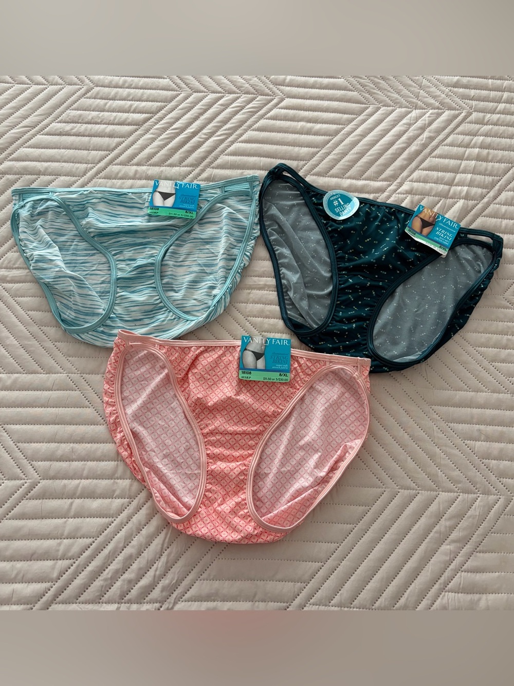 Vanity Fair Bikini Panty Trio Featuring Pink and Teal Accents
Size XL
NWT